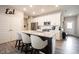 Modern kitchen with white cabinets, stainless steel appliances, and island at 5328 Covington Ave, McCordsville, IN 46055