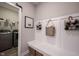 Laundry room with built-in bench and storage at 5328 Covington Ave, McCordsville, IN 46055