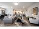Open concept living room with hardwood floors and stylish furniture at 5328 Covington Ave, McCordsville, IN 46055