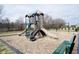 Community playground with a playset, swings, and bench at 5328 Covington Ave, McCordsville, IN 46055