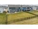 Fenced yard featuring a lawn with well-maintained backyard at 5442 W Turnbuckle Pl, McCordsville, IN 46055