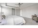 Bright bedroom featuring neutral walls, carpet, a ceiling fan, and a sitting area near the bed at 5442 W Turnbuckle Pl, McCordsville, IN 46055
