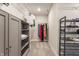 Walk-in closet with built-in shelving and hanging racks offering ample storage at 5442 W Turnbuckle Pl, McCordsville, IN 46055