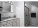 Bathroom features a marble vanity and walk-in shower at 6005 Ralston Ave, Indianapolis, IN 46220