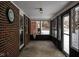 Bright, spacious screened porch with concrete floor and hammock at 6005 Ralston Ave, Indianapolis, IN 46220