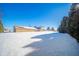 Large backyard covered in snow during winter at 6223 S 425 W, Pendleton, IN 46064