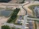 Aerial view of Cardinal Grove community, featuring new homes and roads at 6618 Sulgrove Pl, Indianapolis, IN 46221