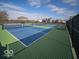 Two pickleball courts with green and blue surfaces at 6618 Sulgrove Pl, Indianapolis, IN 46221