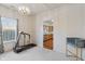 Bright dining room with hardwood floors and access to the kitchen at 7015 Cordova Dr, Indianapolis, IN 46221