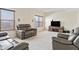 Living room with built in speakers and brown leather recliners at 7015 Cordova Dr, Indianapolis, IN 46221