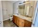 Bathroom with granite countertops and double sinks at 7218 Forrester Ln, Indianapolis, IN 46217