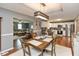 Open-concept dining area connects living room and kitchen, offering a cozy and functional layout at 7775 N Kitchen Rd, Mooresville, IN 46158