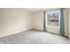 Empty bedroom with neutral walls and carpet flooring at 7817 Dartmouth Rd, Indianapolis, IN 46260