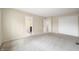 Bright bedroom with access to bathroom and closets at 7817 Dartmouth Rd, Indianapolis, IN 46260