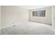 Bedroom with neutral walls and carpet flooring, window view at 7817 Dartmouth Rd, Indianapolis, IN 46260