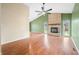 Living room with hardwood floors and fireplace at 7817 Dartmouth Rd, Indianapolis, IN 46260