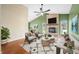 Spacious living room with fireplace and hardwood floors at 7817 Dartmouth Rd, Indianapolis, IN 46260