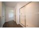 Clean bathroom boasts a glass-enclosed shower and easy access to the bedroom at 7872 Magnolia St, New Palestine, IN 46163
