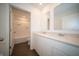 Bright bathroom with a double sink vanity, modern fixtures, and shower-tub combination at 7872 Magnolia St, New Palestine, IN 46163
