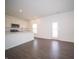 Kitchen area showcasing white cabinets, stainless steel appliances, and a center island for added workspace at 7872 Magnolia St, New Palestine, IN 46163