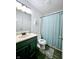 Clean bathroom with dark vanity and updated fixtures at 825 Queensgate Dr, Greenwood, IN 46143