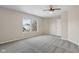 Spacious bedroom with neutral walls, carpet, and ceiling fan at 8371 S Paddleboat Ln, Pendleton, IN 46064