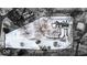 Aerial view shows house and expansive property in winter setting at 9210 Briarclift Rd, Indianapolis, IN 46256