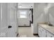 Clean bathroom with a tub and double vanity at 9210 Briarclift Rd, Indianapolis, IN 46256