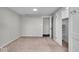Cozy bedroom with neutral walls and carpet, featuring a closet at 9210 Briarclift Rd, Indianapolis, IN 46256