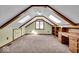 Large bonus room with skylights, built-in desk, and ample storage at 9210 Briarclift Rd, Indianapolis, IN 46256