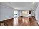 Open living room with hardwood floors and kitchen views at 9210 Briarclift Rd, Indianapolis, IN 46256