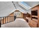 Spacious loft with built-in shelving and skylights at 9210 Briarclift Rd, Indianapolis, IN 46256