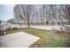 Fenced backyard with patio and mature trees at 10832 Harness Way, Indianapolis, IN 46239
