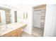 Bathroom boasts a large vanity and walk-in closet at 10832 Harness Way, Indianapolis, IN 46239