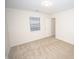 Bright bedroom with neutral carpeting and ample closet space at 10832 Harness Way, Indianapolis, IN 46239
