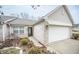 Brick front of home with attached garage and landscaping at 10832 Harness Way, Indianapolis, IN 46239