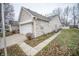 Brick side of home with attached garage at 10832 Harness Way, Indianapolis, IN 46239