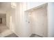 Clean hallway with neutral colors, new flooring and access to other rooms at 10832 Harness Way, Indianapolis, IN 46239