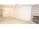 Spacious living room features a fireplace and an open floor plan at 10832 Harness Way, Indianapolis, IN 46239
