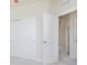 Bedroom with closet with sliding doors, plush carpeting, and an open door at 10948 Hanovarian St, Zionsville, IN 46077