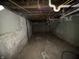 Unfinished basement with exposed utilities and concrete floor at 1318 N Lasalle St, Indianapolis, IN 46201
