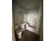 Updated bathroom features a toilet, sink, and bathtub at 1318 N Lasalle St, Indianapolis, IN 46201