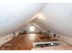 Unfurnished attic with wood floors and a window at 1405 Sheek Rd, Greenwood, IN 46143