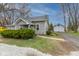 Charming single Gathering home with a detached two car garage and landscaping at 1405 Sheek Rd, Greenwood, IN 46143