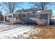 Gray house with a covered patio and fenced backyard at 1405 Sheek Rd, Greenwood, IN 46143