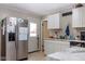 White cabinets, stainless steel appliances, and marble countertops at 1405 Sheek Rd, Greenwood, IN 46143