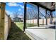 This backyard features a well-maintained lawn, a new fence, and access to the patio at 1656 Roosevelt Ave, Indianapolis, IN 46218