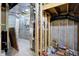 Unfinished basement with HVAC unit and plumbing at 1656 Roosevelt Ave, Indianapolis, IN 46218