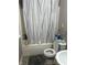 Clean bathroom with tub, toilet, and shower at 1726 Mccollough Dr, Indianapolis, IN 46260