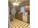 Kitchen with wood cabinets and dishwasher at 1726 Mccollough Dr, Indianapolis, IN 46260